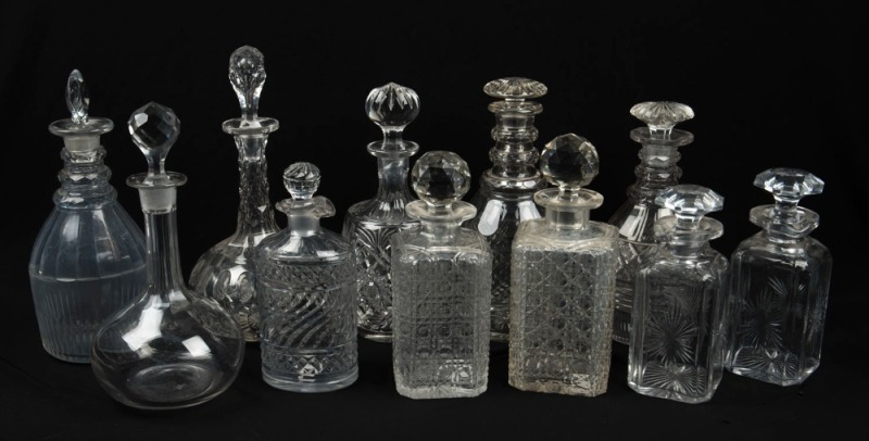 DECANTERS group of eleven antique crystal examples, 19th and 20th century, ​​​​​​​the largest 31cm high