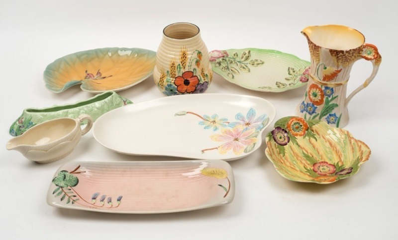 CLARICE CLIFF green porcelain flower trough and cream jug, FALCON WARE floral porcelain jug, WADEHEATH Art Deco porcelain vase, and five assorted English porcelain serving dishes including SHORTER & SONS and CARLTON WARE, (9 items), the Clarice Cliff flow