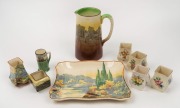 ROYAL DOULTON&nbsp;Series Ware jug, serving plate, miniature jug and six assorted vases, (9 items), factory marks to the bases, ​​​​​​​the jug 17cm high