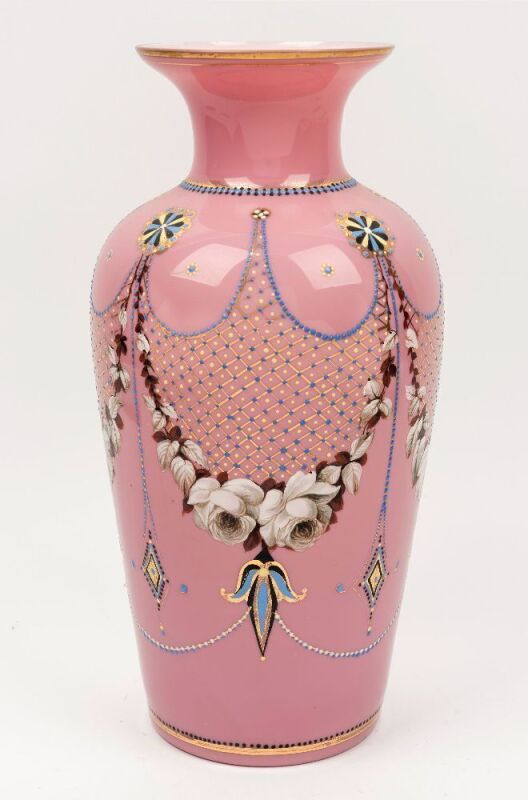 An antique pink glass mantle vase with enamel decoration, 19th century, ​​​​​​​35cm high