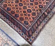 A hand-knotted tribal rug with brown and orange ground (fair condition only), ​​​​​​​213 x 118cm - 2