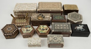 Thirteen assorted Indo-Persian and Middle Eastern jewellery and trinket boxes, plus a desk set, 20th century, (14 items), the largest 20cm wide