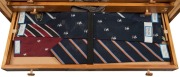 A COLLECTION OF CRICKET TIES HOUSED IN A SUPERB CUSTOM BUILT TIMBER CHEST OF DRAWERS WITH REMOVABLE FRONT REVEALING THE NUMBERED AND LABELLED DRAWERS: More than 220 ties, including West Indies Tour 1950s, Singapore 1950s; Australian Test Team 1969/70 Tour - 3