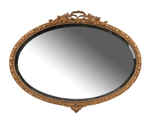A vintage oval gilt framed mirror, early to mid 20th century, 57 x 75cm
