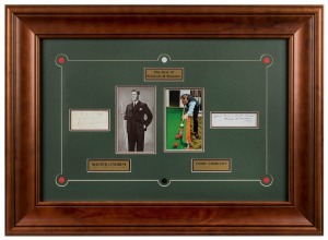 A framed display featuring the original signatures of WALTER LINDRUM and EDDIE CHARLTON together with pictures of the two greats, explanatory plaques and accompanied by a CofA attached verso. Overall 57 x 78cm.