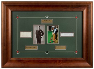 A framed display featuring the original signatures of WALTER LINDRUM and EDDIE CHARLTON together with pictures of the two greats, explanatory plaques and accompanied by a CofA attached verso. Overall 57 x 78cm.