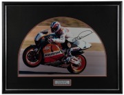 FOUR AUSTRALIAN SPORTING GREATS: A PETER BROCK signed 1997 "Mount Panorama 1000 Classic" programme (framed); a MICHAEL DOOHAN signed action photograph (framed); a LAYNE BEACHLEY signed Billabong poster (framed); and a KIEREN PERKINS signed photograph (fra - 2