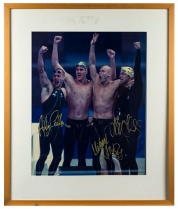 The victorious Australian Men's 4 x 100m Freestyle Relay team: the moment of victory photograph signed by Thorpe, Klim, Callus and Fydler; framed and glazed, overall 69 x 58cm.