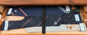 A COLLECTION OF CRICKET TIES HOUSED IN A SUPERB CUSTOM BUILT TIMBER CHEST OF DRAWERS WITH REMOVABLE FRONT REVEALING THE NUMBERED AND LABELLED DRAWERS: More than 220 ties, including West Indies Tour 1950s, Singapore 1950s; Australian Test Team 1969/70 Tour - 6