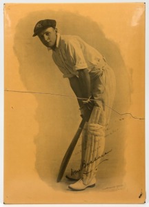 Don Bradman, tin-plate Sidney Riley Studios photo (35 x 24.5cm) showing Bradman in his batting stance, c1929, with facsimile autograph (and additional feint inscription). Horizontal crack, but extremely scarce; only one other example known to us.