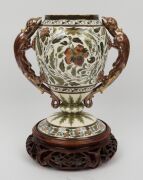 ZOLNAY antique Hungarian porcelain urn on later carved Chinese wooden base, blue factory mark to base. Note: missing lid, 31cm high overall - 2