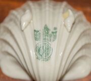 BELLEEK group of Irish porcelain vases, jugs and bowls, (9 items), one black stamp jug, the others with varying green stamps, the largest 15cm high - 11