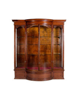 Shop display/trophy cabinet: 4 Door carved walnut late 19th century. Height 221cm, width 200cm, depth 65cm