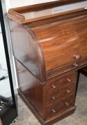 An antique English mahogany cylinder top twin pedestal desk with well fitted interior veneered in maple, sliding desk top and leather inset adjustable slope, each pedestal with three graduated drawers, circa 1860, 112cm high, 149cm wide, 68cm deep - 3