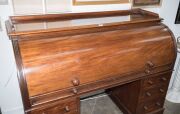 An antique English mahogany cylinder top twin pedestal desk with well fitted interior veneered in maple, sliding desk top and leather inset adjustable slope, each pedestal with three graduated drawers, circa 1860, 112cm high, 149cm wide, 68cm deep - 6