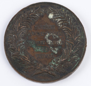 MEDALLIONS: 1875 Third Inter Colonial Exhibition bronze 70mm medallion by Stoke & Martin, obverse inscribed 'MELBOURNE 1875' & 'PHILADELPHIA 1876' showing explorers beside a globe with rising sun above, reverse with wreath surrounding 'INGENS/PATEAT TELLVS/NEC SIT TERRIS/VLTIMA/THVLE', edge (5mm) inscribed 'MESSrs A. & R. CAUGHEY.'; Fair/G overall.
