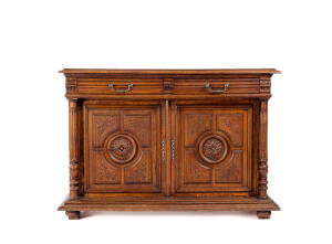 French oak sideboard with carved panel doors & fluted columns, 1890s. Height 97cm, width 140cm, depth 52cm.