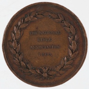 GREAT BRITAIN: The National Rifle Association 1860 bronze medal by G.G. Adams, depicting an archer and a rifleman, 48mm