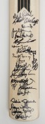 A full size Newbery Handmade Assault cricket bat signed by numerous cricketers who participated in the 2000 MS International Cricket Classic at Werribee Park Mansion in Melbourne. Together with an official programme&nbsp;for the event, also extensively signed. - 2