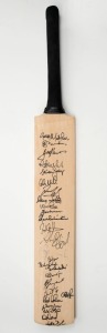A full size cricket bat signed by numerous cricketers who participated in the 2002 MS International Cricket Classic. Together with an official programme for the event. The signatories include Greg Matthews, Geoff Lawson, Graham Yallop, Doug Walters, Sunil