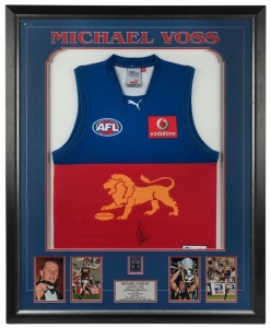 BRISBANE - MICHAEL VOSS signed Brisbane Lions jersey from the era in which he played - the display includes a replica Brownlow medal, four action photos and a plaque. Comes with ASM Certificate of Authenticity. Framed: 109 x 88cm.