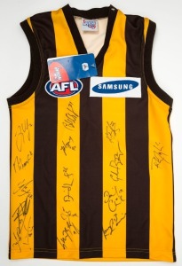 HAWTHORN FOOTBALL CLUB: An official club jumper (short sleeves) signed by numerous players on the 2000 Hawthorn List. Accompanied by a letter from Hawthorn signed by Carl Saunder. The signed jumper was donated to the Port Melbourne Football Team for assis