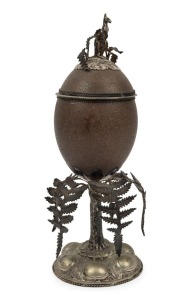 An antique Australian silver plated emu egg cup and cover adorned with fern fronds and kangaroo finial, interior handsomely gilded, 19th century, 27.5cm high