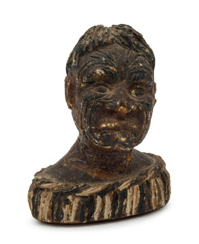 New Zealand kauri gum carving of a Maori warrior, 19th century, ​​​​​​​9cm high