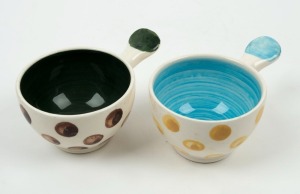 ARTHUR MERRIC BOYD pair of pottery ramekins with hand-painted decoration, incised "A.M. Boyd", 5.5cm high, 13.5cm wide
