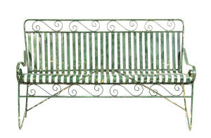 GARDEN BENCH: Green painted iron work with scrolling arm rests, c1950s. Height 84cm, width 138cm, depth 55cm