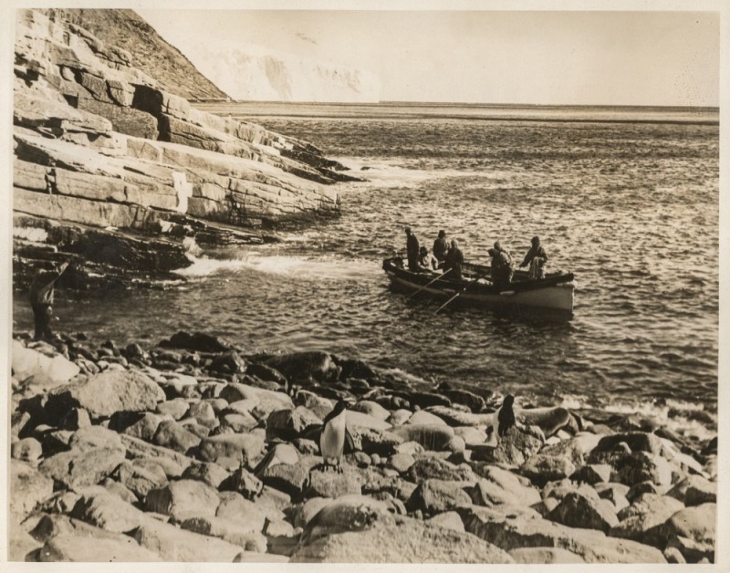 THE B.A.N.Z. ANTARCTIC EXPEDITION:Official original photograph by Captain Frank Hurley:Image B2 - Title: Landing at Cape Bruce, MacRobertson Land,with official "MAWSON ANTARCTIC EXPEDITION" handstamp and release date "MONDAY APR. 6, 1931" verso, together