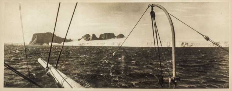 THE B.A.N.Z. ANTARCTIC EXPEDITION:Official original photograph by Captain Frank Hurley:Image B18 - Title: New Antarctic Lands Discovered by the B.A.N.Z. Expedition,with official "MAWSON ANTARCTIC EXPEDITION" handstamp and release date "TUESDAY JUN. 16, 19