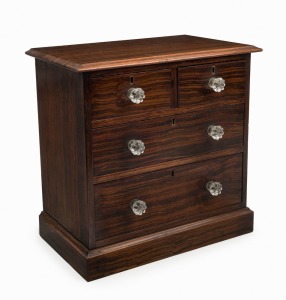 APPRENTICE CHEST of four drawers with unusual cuts of ribbon cedar with glass knobs and kauri pine secondary timbers, 19th century, 37cm high,37cm wide, 22cm deep