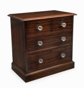 APPRENTICE CHEST of four drawers with unusual cuts of ribbon cedar with glass knobs and kauri pine secondary timbers, 19th century, ​​​​​​​37cm high,37cm wide, 22cm deep