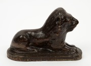 An antique Australian pottery lion doorstop, 19th century, ​​​​​​​incised "L.B.", 15cm high, 22.5cm long - 2