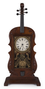 VIOLIN shelf clock by Seth Thomas, time and strike 8 day movement, 81cm high PROVENANCE The Tudor House Clock Museum, Yarrawonga