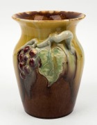 REMUED&nbsp;pottery vase with applied grapes and leaf, incised "Remued, Hand Made", 19cm high