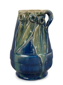 PAMELA blue and green glazed pottery vase with applied gumnuts, leaves and branch handle,  incised "Pamela Hand Made",  21cm high 