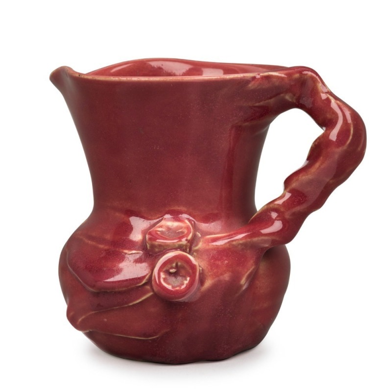 REMUED early full pink glaze pottery jug with applied gumnuts, leaves, branch handle and scratching,  incised "Remued", ​​​​​​​10cm high 