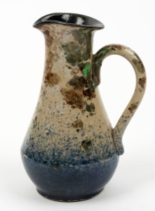 P.P.P. (PREMIER POTTER PRESTON) jug with speckled and sponge work glaze, circular black factory mark to base "P.P.P.", further incised "13", 12cm high