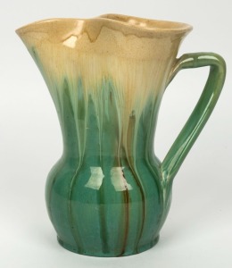 REMUED green glazed pottery jug with branch handle,  incised "Remued 146L", ​​​​​​​20cm high 