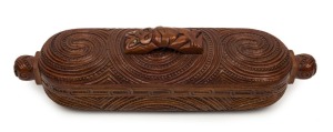 Maori treasure box, carved wood and paua shell, 20th century, 31cm wide