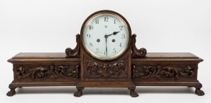 JUNGHANS vintage German mantle clock in unusual carved oak case with storage box compartments, time and strike movement with Arabic numerals, early 20th century, 33cm high, 75cm wide