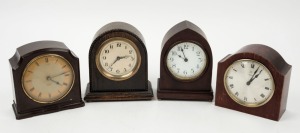 Four assorted vintage table clocks in timber and bakelite cases, early to mid 20th century, ​​​​​​​the largest 17cm high