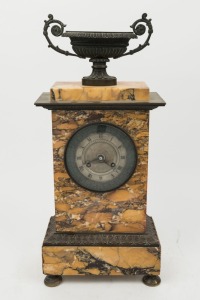 An antique French mantle clock in Sienna marble case with cast metal urn decoration, Eight day time and strike movement with silk suspension, Roman numerals and silvered dial, 19th century, 42cm high
