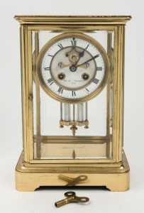 An antique French four glass library clock with mercury compensated pendulum, open escapement, enamel dial and Roman numerals, 19th century, 27cm high