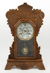 NEW HAVEN antique American cottage clock in pressed oak case, eight day time and strike movement with Roman numerals, 19th century, ​​​​​​​56cm high