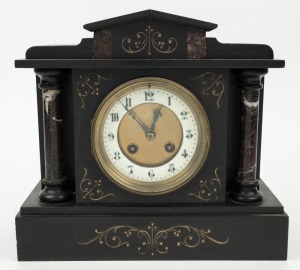 An antique French mantle clock in black slate case with rouge marble columns, eight day time and strike movement with Arabic numerals, 19th century, 25cm high