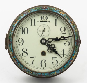 A vintage circular wall clock in brass and enamel case, 19cm diameter