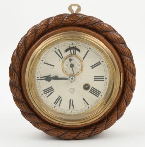 ANSONIA antique lever escapement movement circular wall clock with rope twist carved decoration, 19th century, 23cm diameter.